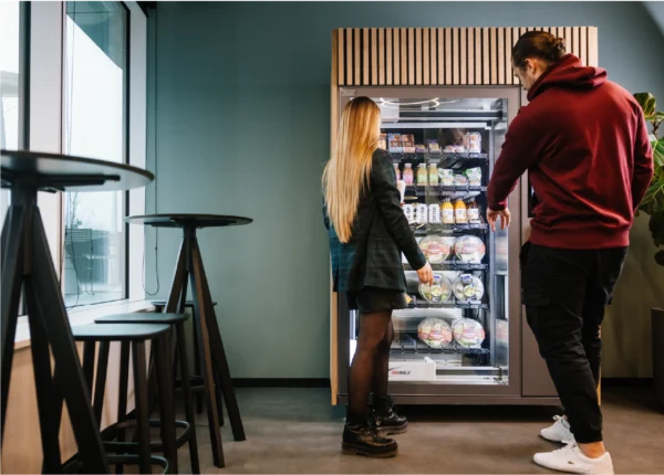 People around vending machine
